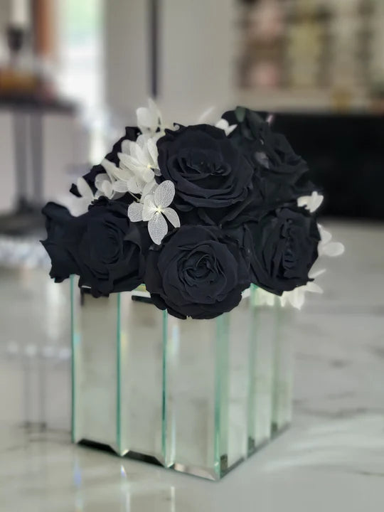 The Rose Maven - All Rights Reserved black preserved roses in a mirror vase